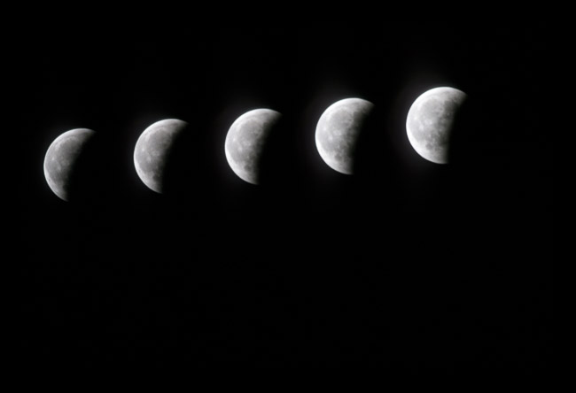 Stages in lunar eclipse, Cambridgeshire (2001).  Scanned from slide.
